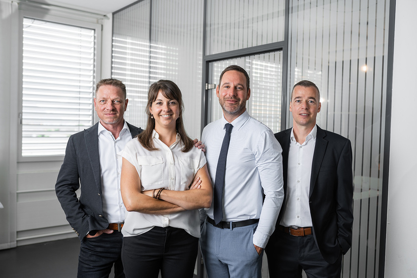 Vier Personen im Business-Look Vier Personen im Business-Look